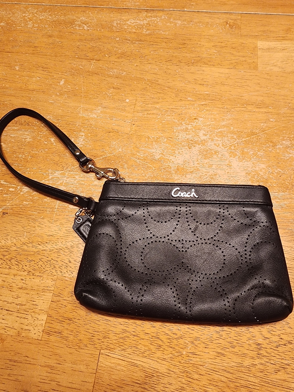 Coach Ashley Perforated Leather Signature C Wristlet in black